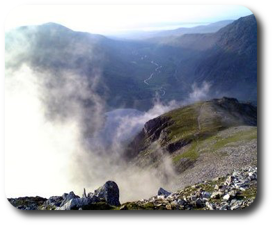 Mountain view with clouds and distance, symbolising the hidden in dreams 
					and the depth of vision that can be gained from having a dream interpretation 